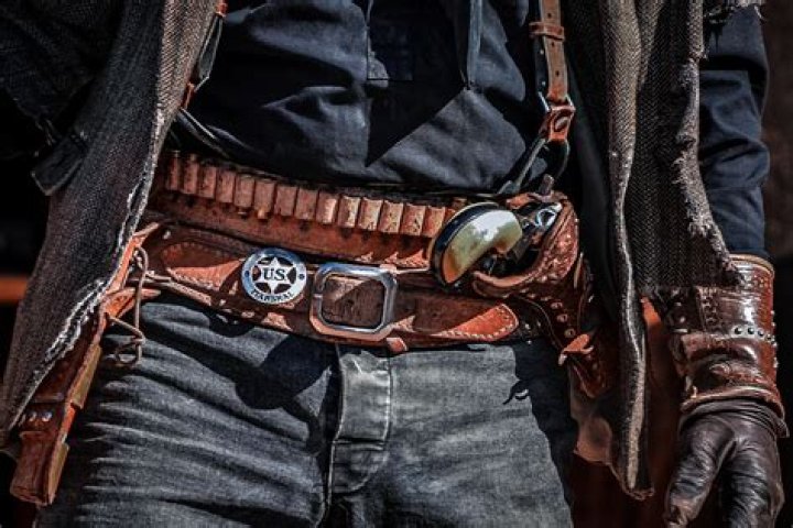 Did cowboys really wear guns?