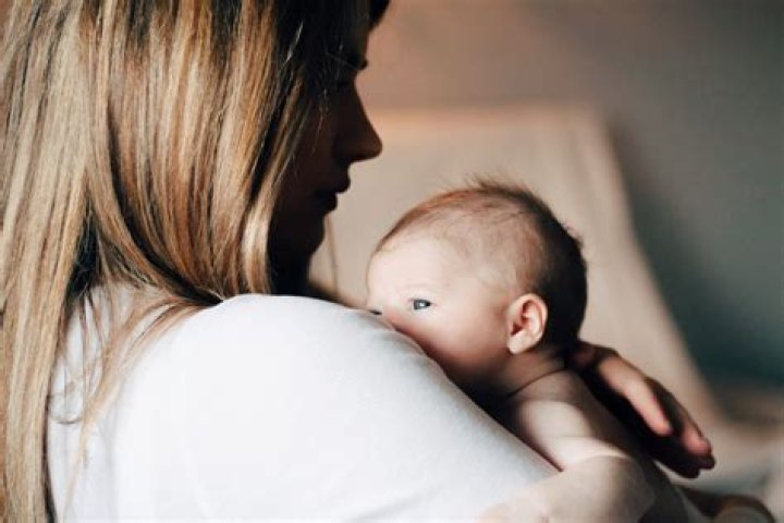 Should i wake my newborn to feed at night?
