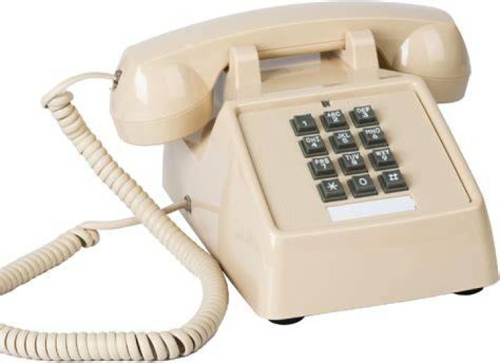 When were push button phones introduced?
