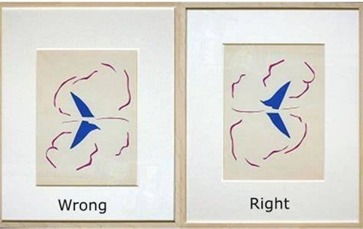 Whose painting was hung upside down?