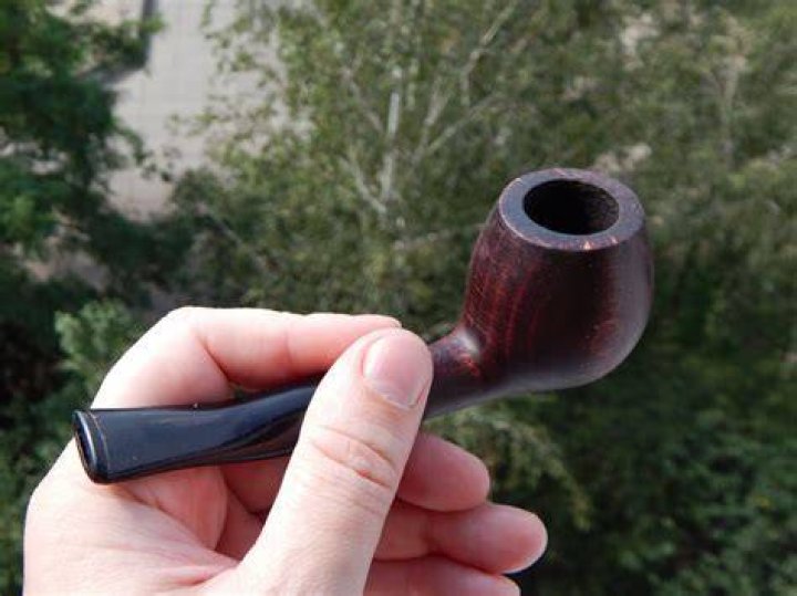 Why do pipe smokers not inhale?
